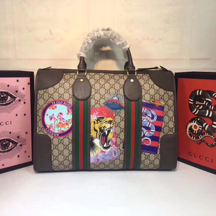 G*u*i top handle bags